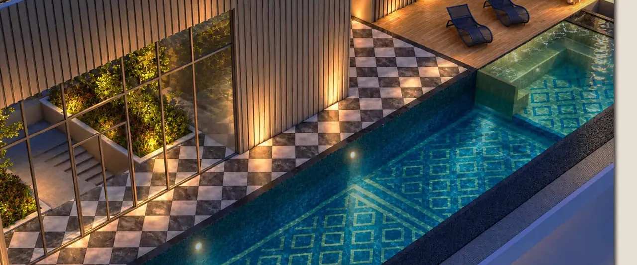 Luxe pool and jacuzzi with patterned tiling